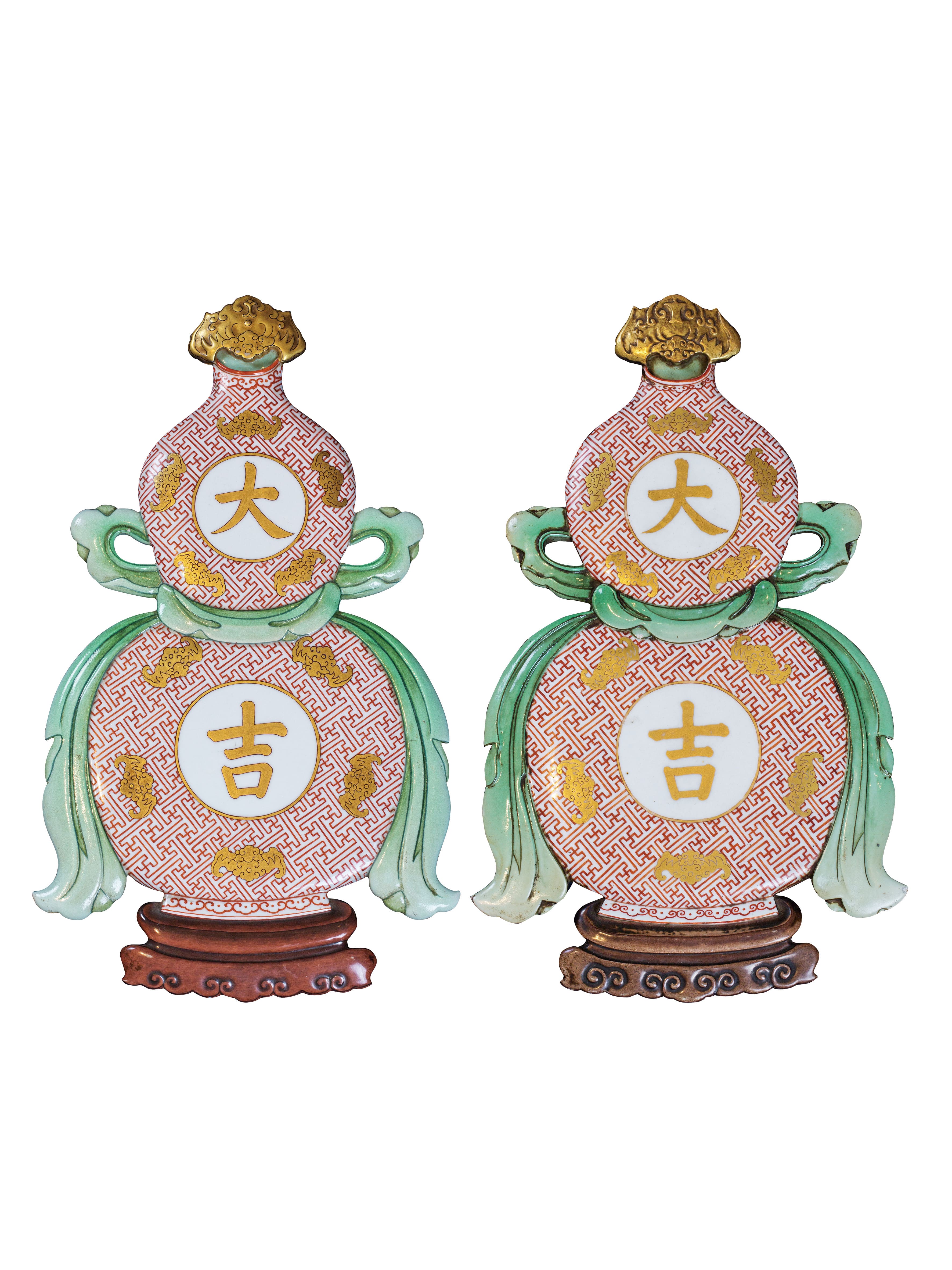 A pair of ‘Da Ji' double gourd wall vases, Qing Dynasty, Qianlong period (1736-1795)