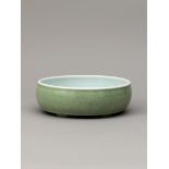 A pale green glazed brush washer, Qing Dynasty, Qianlong Period (1736-1795)