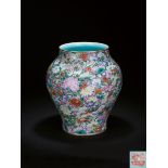 A famille-rose ‘mille-fleurs' vase, Qing Dynasty, Qianlong six-character seal mark and of the period