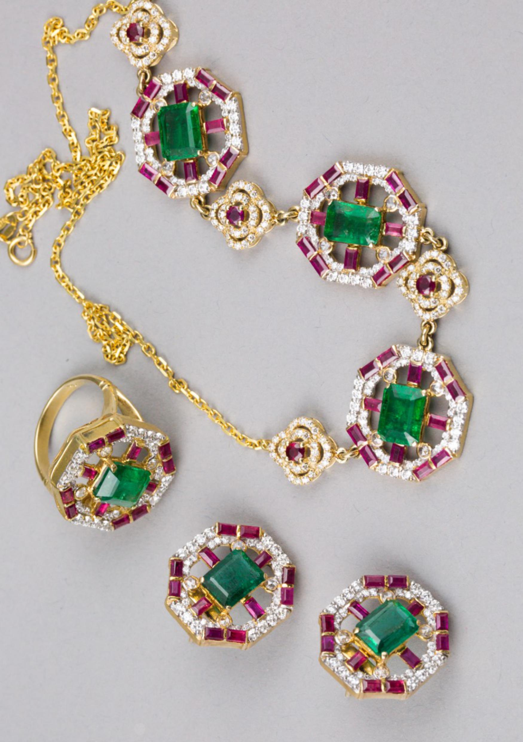 A 18K Yellow Gold Emerald Ruby and Diamond Set