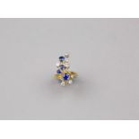 A 18K Sapphire and Diamond Ring