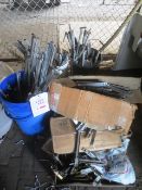 Contents of three plastic bins and four boxes, to include assorted UPVC window hinges
