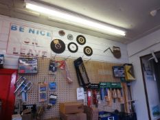 Quantity of hand tools, drill bits, etc., located on display wall