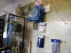 Steel frame storage rack and contents including assorted cutting bits, consumable stock, etc.