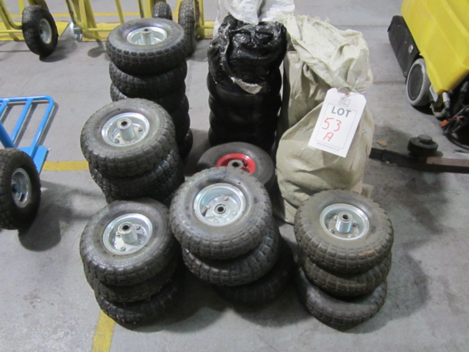 Quantity of assorted new and used sack truck wheels and tyres