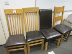 Four assorted leather cushioned dining chairs