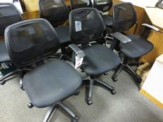 Three black mesh/cloth swivel arm chairs