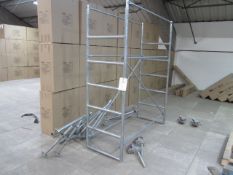 Mobile scaffold tower including out riggers, wheels, 2 x working platforms, etc. approx. size: 1.