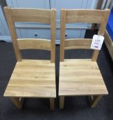 Two oak framed dining chairs (Showroom Furniture)