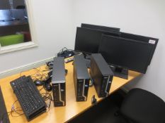 Four Acer Veriton computer systems, four flat screen m monitors, four keyboards, four mice, two