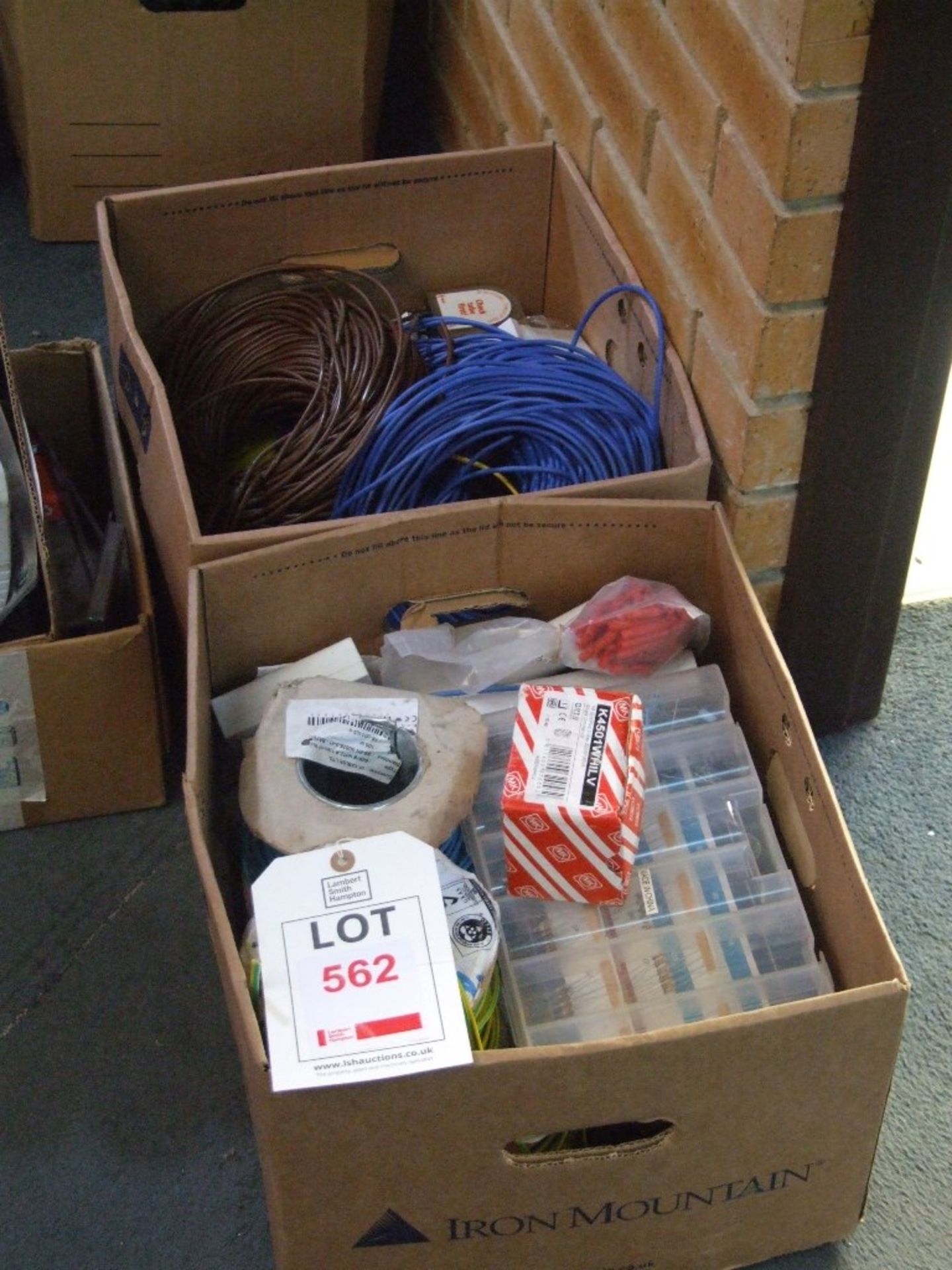 2 boxes of various electrical components to include wire, resisitors, sockets etc.