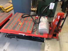 Warrior model HFT-G powered scissor lift, serial number 12101406-5014, SWL 1000kg (2012), approx...