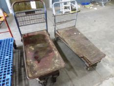Two mobile transport trolleys