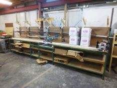 Steel framed work bench, approx 6m in length, with attached rack storage (Please note: A work Method