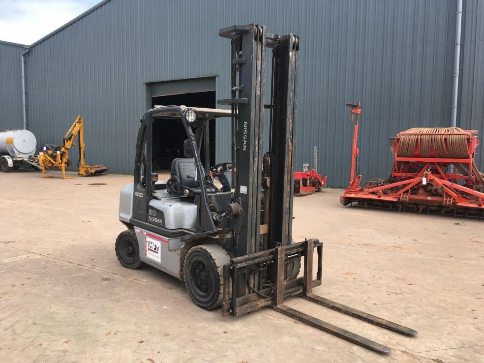 Nissan 30 four wheel, diesel, ride on forklift truck with side shift and 6m mast, model YG1D2A30Q,