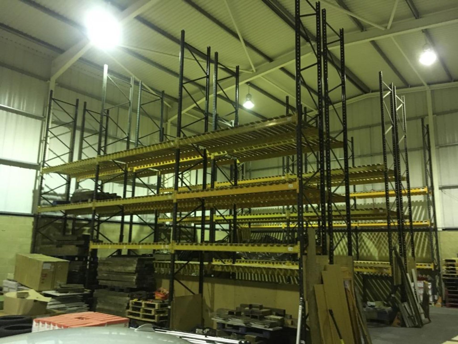 15 bays of boltless racking comprising 20 vertical frames measuring 7.5m tall and 1.1m deep and 86