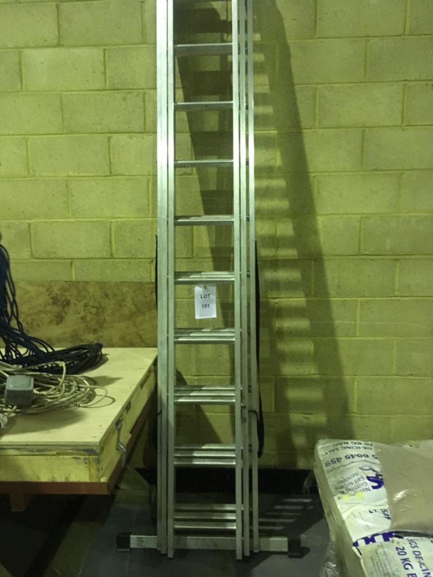 Three stage, 10 tread, aluminium ladder. Please note: This lot is located at 6 Dewar Close,