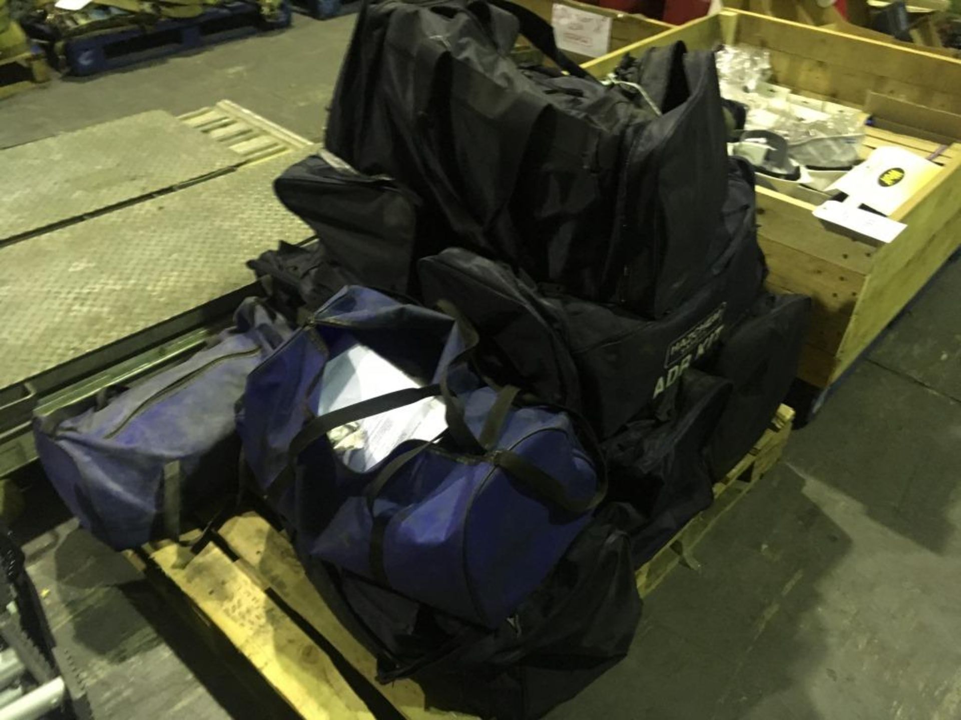 A quantity of hazardous material kits and spare PPE on two pallets. Please note: This lot is located