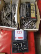 Assorted compasses, paper clamps etc