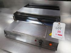 Stainless steel bench top film dispenser/heat sealer