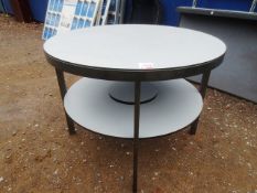 Two steel framed, grey topped circular tables, approx 1m dia (only one in image)