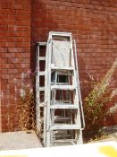 Three assorted aluminium A frame ladders