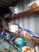 Three shelves of assorted PPE