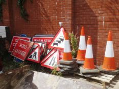 Assorted road signs and cones