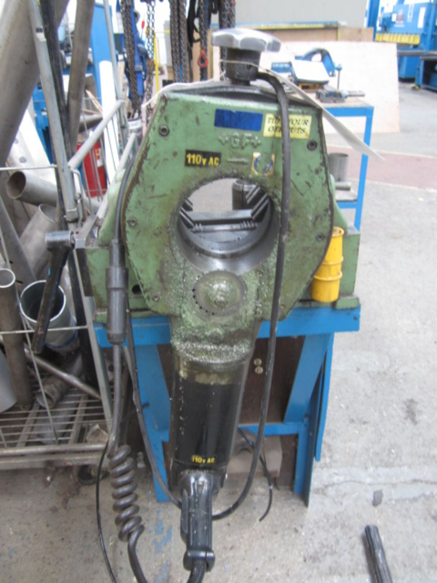Georg Fischer pipe cutter, approx. cutting diameter 120mm,110v mounted on work bench.