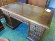 Contents of directors office to include wooden kneehole desk fitted nine drawers, letherette captain