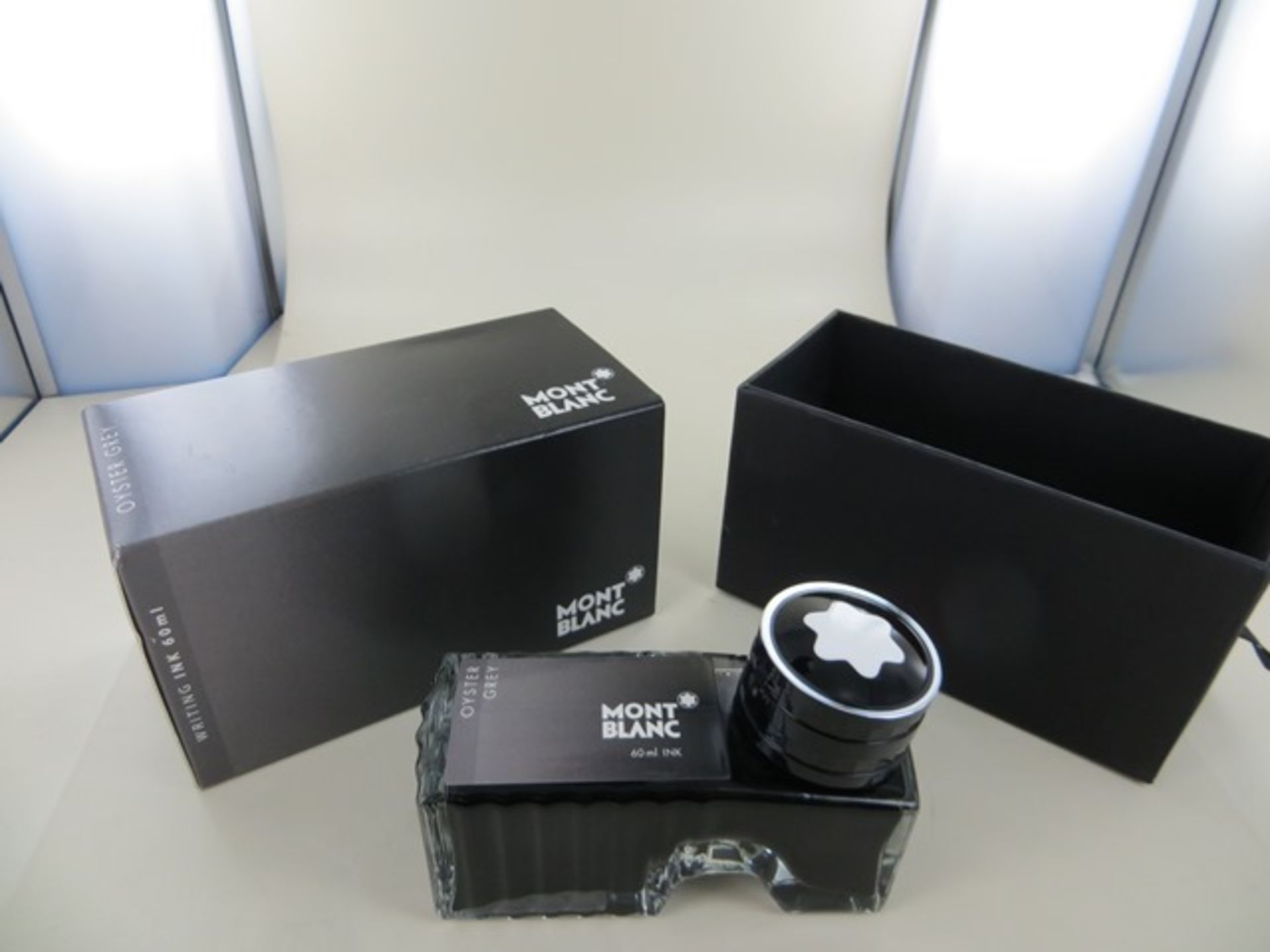 Four Montblanc Ink Bottles Oyster Grey 60ml Art No 105186 RRP £16 each. Please note: This lot will