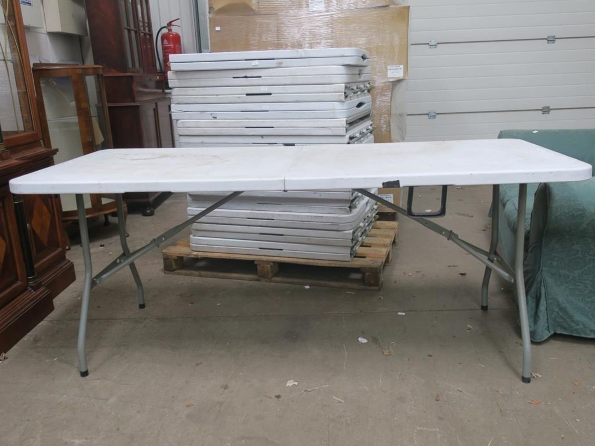 A pallet containg fourteen foldable tables. Please note there is a £10 +VAT Lift out fee on this - Image 3 of 3