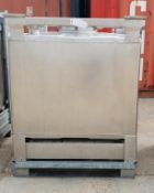 * A Stainless Steel IBE - 950 Litres. A Stainless Steel 950 Litre IBC with inspection cover, 2