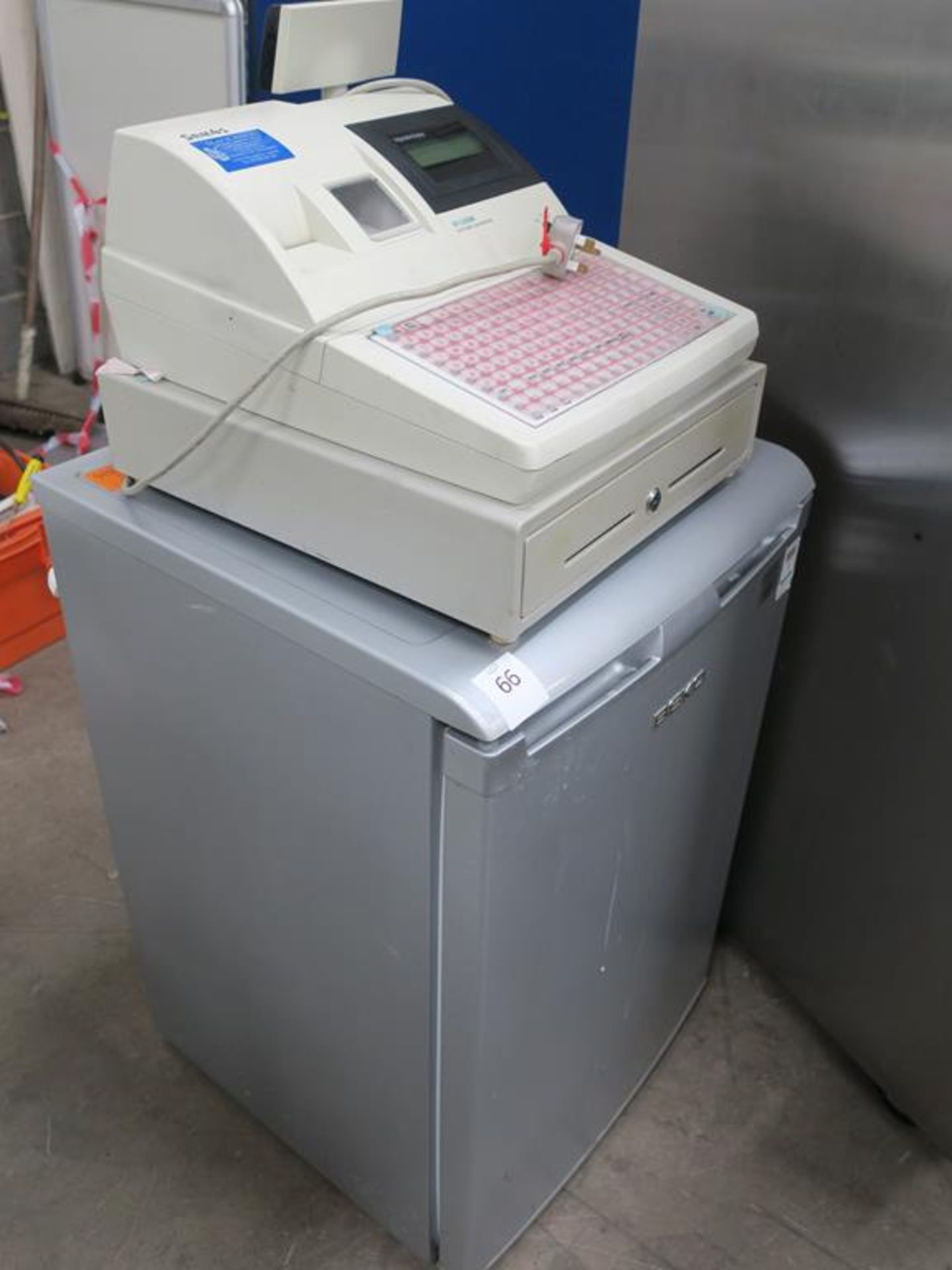 * A Beko Fridge together with a ER-5200M Electronic Cash Register