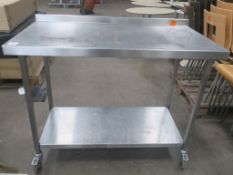 * A Two Tier s/steel Preparation Table on castor wheels.