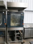 * A stainless steel Commercial Combi MiWe Aero E+ Oven (model AE80604) on s/steel mobile eight