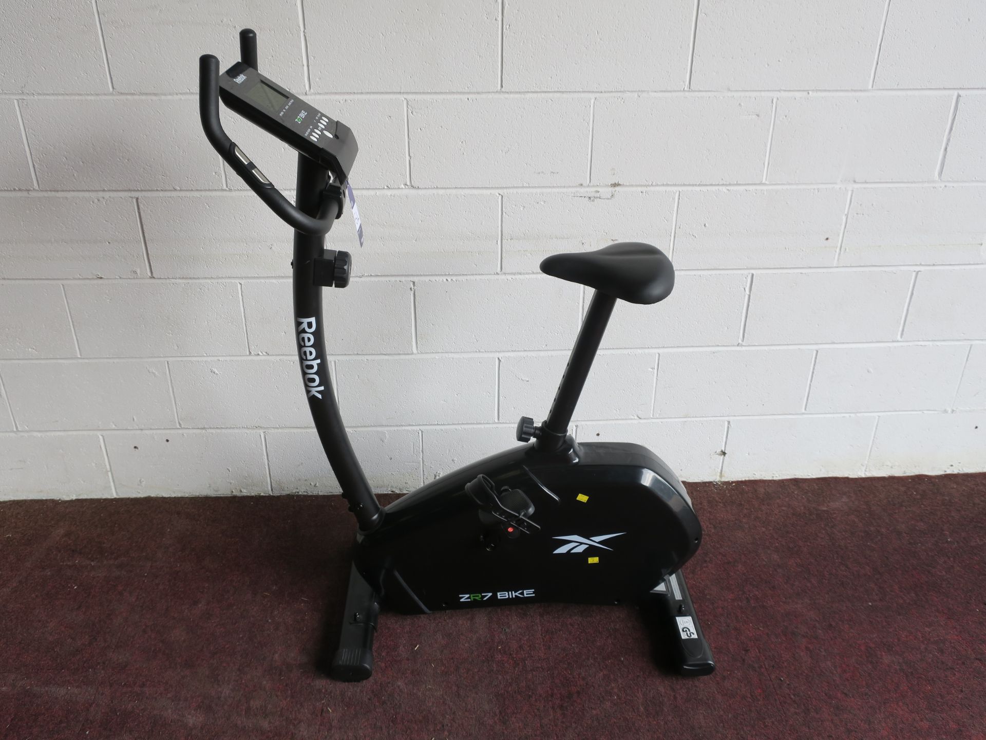 A Reebox ZR7 Upright Exercise Bicycle (needs new batteries)