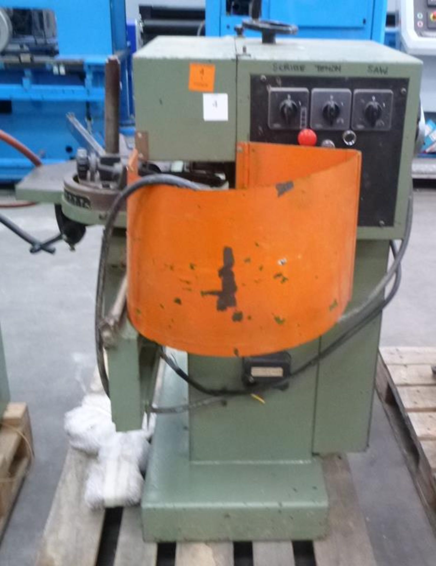 * An SCM Samco Tenon/100, 4 head single end Tenoner