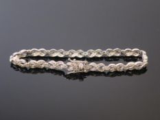 A Diamond Bracelet Chain (Hallmarked) Silver (est £50-£100)