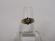 A 9ct Gold, Diamond and Topaz? Ring (Size N) (est £45-£90)