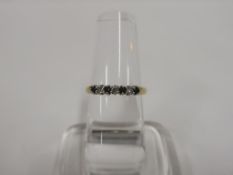A 9ct Gold, Diamond and Topaz? Ring (Size P) (est £50-£90)