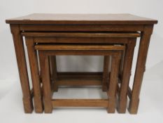 A Robert Thompson of Kilburn ''Mouseman'' Nest of Three Oak Coffee Tables (N.B. mouse with long