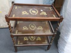 A Three Tier Wooden Tea Trolley on Original Casters. Each 'Tray' is decorated with Raised Floral