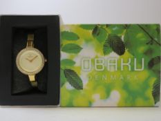 * An Obaku Ladies Watch made in Denmark Model V129LEGGMG. The case is PVD Gold Plated (new,