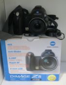 A Konica Minolta Dimage Z5 Digital Camera complete with User Manual and CD (est £15-£25)