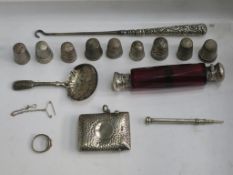 A lot to include miscellaneous small silver items: a Georgian Silver Candy Spoon, Propelling Pencil,