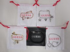 * Five items of new 'Guess' jewellery to include Pendants and Bracelets (each with either a