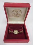 A Ladies Omega Watch with 9ct Gold Strap and Case Ring (est £120-£180)