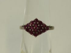 A Ruby Set Silver Cluster Ring (size M 1/2) (est £20-£40)