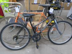 A Ladies Raleigh Raven 5 Speed Bicycle with Shimano Gears, Reflective Pedals together with an orange